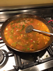 A pan filled with Hungarian Goulash simmering on the stove.